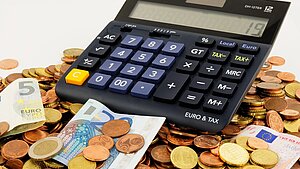 Geld und Taschenrechner Geld und Taschenrechner
